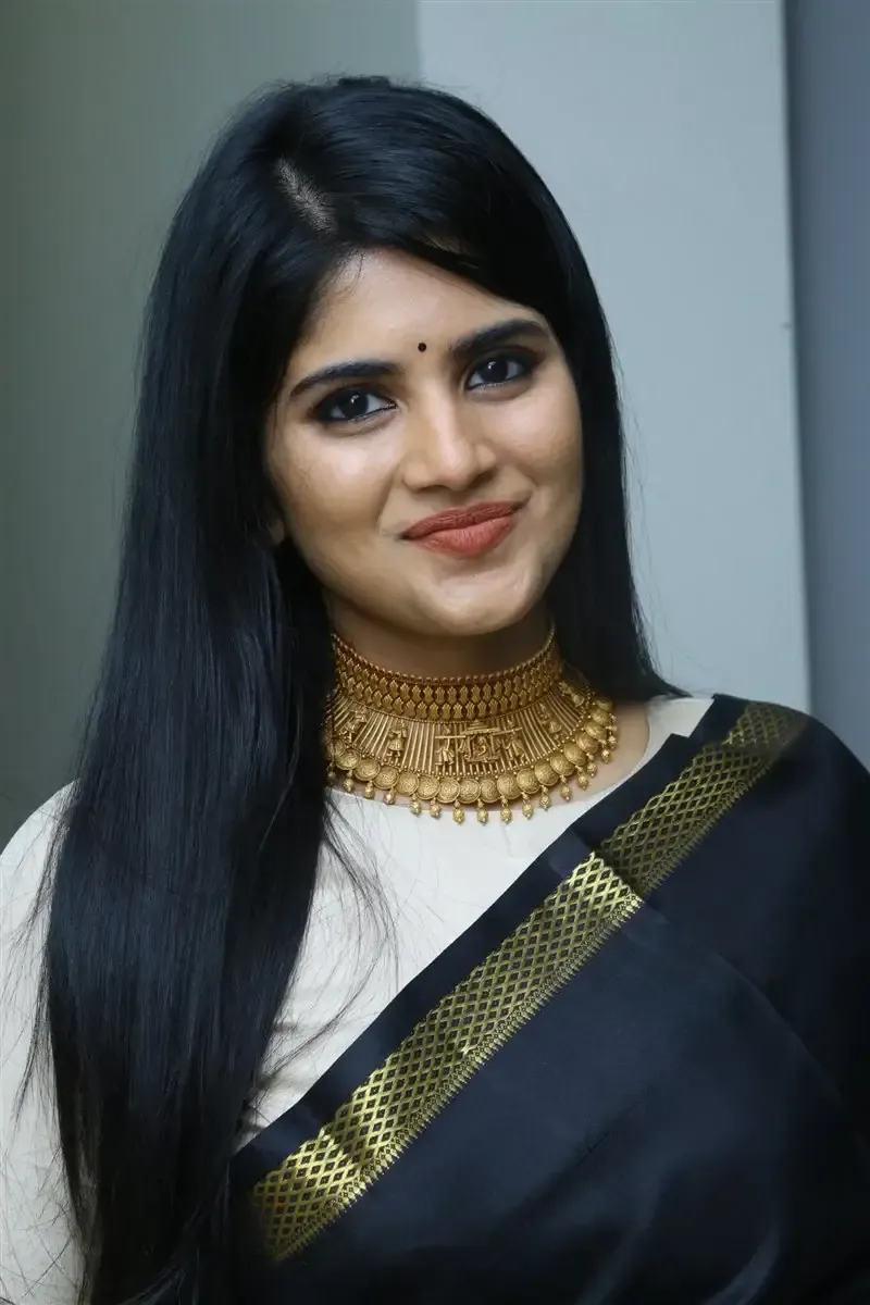 Megha Akash in Black Saree at Manu Charitra Telugu Movie Trailer Launch